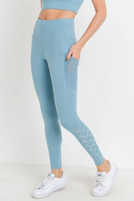 Leggings de cintura alta con bolsillos completos, malla híbrida y tirantes de celosía