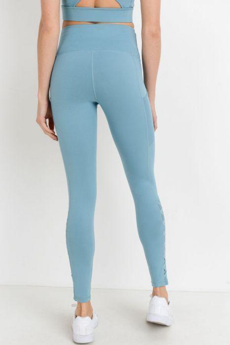 Leggings de cintura alta con bolsillos completos, malla híbrida y tirantes de celosía